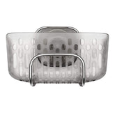 OXO StrongHold basket inside a sink keeps oversized sponges organized