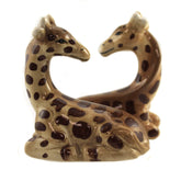 Pacific Giftware giraffe magnetic salt shaker for easy table seasoning.