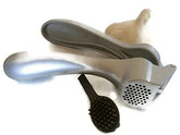 Pampered Chef garlic press in easy-squeeze action for garlic cloves