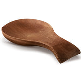 Patelai Acacia spoon rest on stove top keeps counters clean and organized.