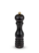 Peugeot Paris manual pepper mill in chocolate finish shows precise grind for table flavor.