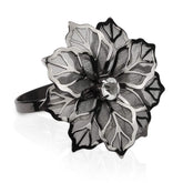 Picowe napkin rings with hollow flower add elegant texture to gun metal tables.