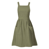 Pinknoke olive green apron fabric close-up showing breathable cotton-linen blend for comfort.