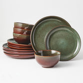 Pokini stoneware dinnerware service for four with plates and bowls for everyday dining.