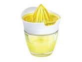 Prepara The Juiciest Juicer with juice flowing into the 5 oz glass jar
