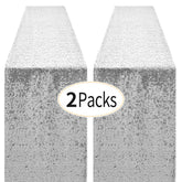 Pufogu silver sequin table runner on a table adds festive shimmer for events.
