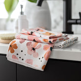 RECYCO waffle towel in Blossom Breeze pattern, stylish and absorbent for daily kitchen tasks.