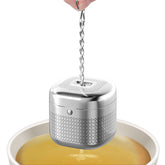 Reinmoson tea ball with ultra-fine mesh for clear, sediment-free tea.