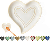 Rhobtyne heart spoon rest on stove top catches drips and adds charm.