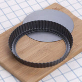 RICHSC-PAN 9-inch tart pan with detachable base for easy release.