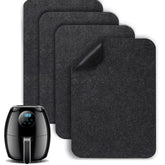 Runeaoys heat-resistant mats under the air fryer on a countertop protect surfaces.
