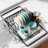 Sakugi dish drying rack in sink with extendable bars for a secure, space-saving set-up