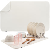 S&T INC. jumbo dish drying mat in cream shown under a rack absorbing water efficiently