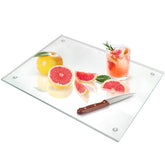 Seelenruhe tempered glass cutting board front view with non-slip feet for stable prep.