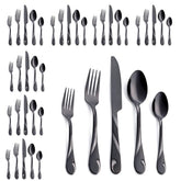 Seeshine black silverware set for eight on a table with elegant dinnerware