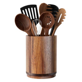 Segtenant utensil holder on counter with acacia wood finish for easy access.