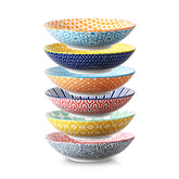 Selamica porcelain 40oz 9-inch bowls with colorful patterns, ideal for pasta and salads.
