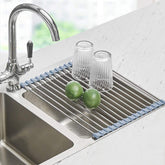 Seropy roll up dish drying rack over sink assembly for organized kitchen space.