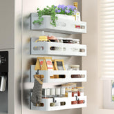 Sevenblue magnetic spice rack on fridge door for easy access.