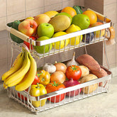 Sevenblue two-tier fruit basket with banana hangers organizes counter fruit.