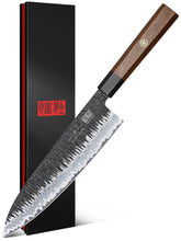 SHAN ZU gyuto knife blade close-up showing nine-layer clad steel and sharp edge.