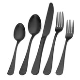 ShareCook matte black silverware set on a modern dining table.