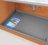 SIKADEER under-sink mat 34x22 guards cabinets from leaks with raised edges.