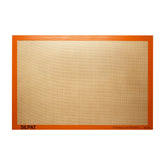 Silpat original non-stick baking mat fullsize on a sheet pan for easy release