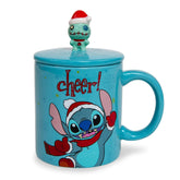 Silver Buffalo Disney Lilo & Stitch mug with lid featuring Stitch in a Santa hat for festive coffee.