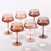 SIPBYSOP Venus Coupe amber glass highlights vibrant cocktails for festive occasions
