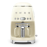 Smeg 50's retro drip coffee machine front view in cream showing vintage charm and modern build