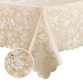 Smiry rectangle beige table cloth with embossed edge for elegant dining protection.
