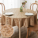 Smiry round table cloth with floral embossing and scalloped edges for an elegant setting.