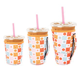 Snowso Groovy Flowers iced coffee sleeve 16-18oz front view keeps hands dry.