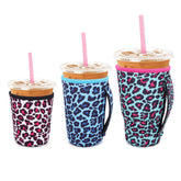 Snowso leopard iced coffee sleeve small, enhances grip for cold drinks.