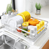 SNTD dish drying rack shows large capacity for plates and bowls on a kitchen counter.