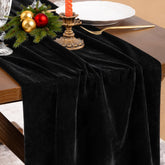 Socomi black velvet table runner on a dining setup for a luxurious look.