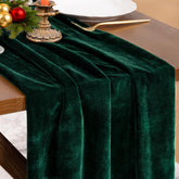 Socomi green velvet table runner in emerald enhances wedding and holiday dining experiences.