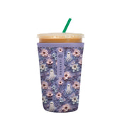 Sok It JavaSok ghostly garden iced coffee sleeve around a cup for cold drinks with comfy grip.