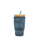 Sok It JavaSok insulated sleeve on foggy woods cup keeps drinks cold and hands warm