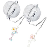 Sopopal daisy pink tea infuser pendant for stylish, leak-free tea brewing.