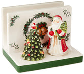 Spode Christmas Tree napkin holder with holly detail promotes festive table organization