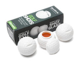 Sport Shots golf-ball shot glasses set displayed on a green, ideal for golf outings.