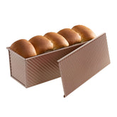 SS&CC Pullman pan with lid demonstrates uniform sandwich bread slices