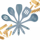 StarPack Stir and Serve spatula-turner on nonstick pan, heat resistant.