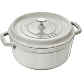STAUB 4-qt round cocotte White Truffle enamel for even browning and rich flavor.
