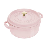 Staub Peony Pink Dutch Oven top view highlights premium cast iron for even heating.