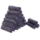 Sunny zzzZZ 24-pack dishcloths close-up shows plush coral fleece with strong absorption