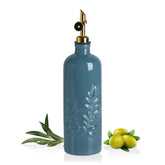 Sweejar oil dispenser with olive leaf relief design enhances kitchen decor and pour control.
