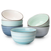 Sweese 20oz porcelain cereal bowls with hand-painted colors for a vibrant tablescape.